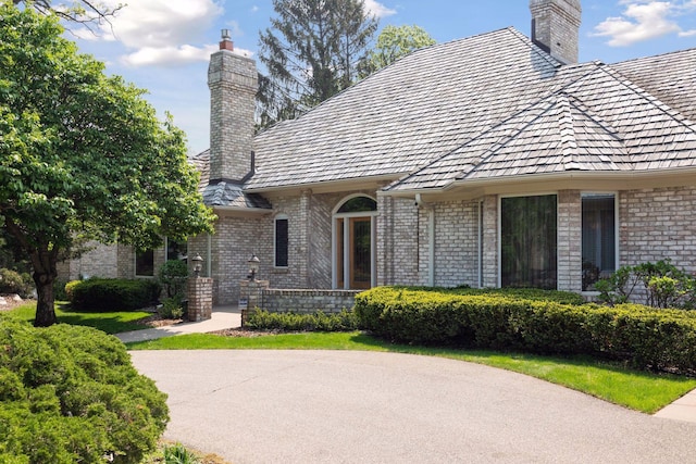 4 Antrim Ter, Edina, MN 55439 - view of front facade with brick siding and a chimney