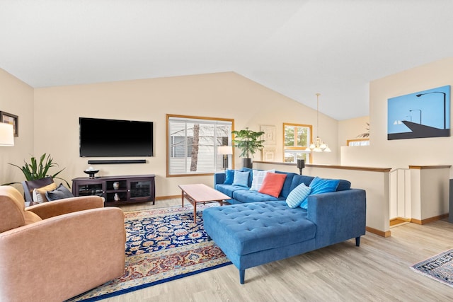 6108 Creek Line Dr, Minnetonka, MN 55345 - living room featuring vaulted ceiling, wood finished floors, and baseboards