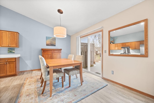 6108 Creek Line Dr, Minnetonka, MN 55345 - dining space with light wood-style floors and baseboards