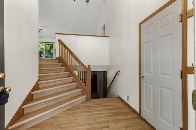 2294 Mathias Rd, Shakopee, MN 55379 - stairway featuring wood finished floors