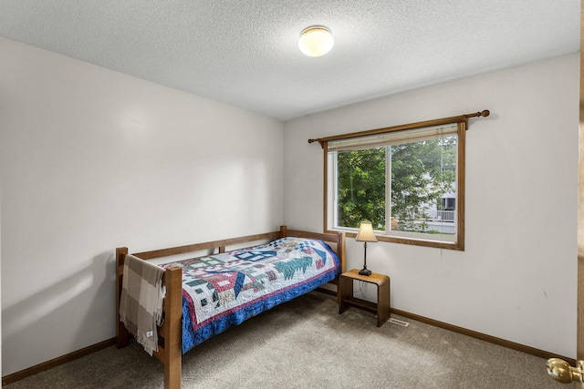 2294 Mathias Rd, Shakopee, MN 55379 - carpeted bedroom with baseboards and a textured ceiling