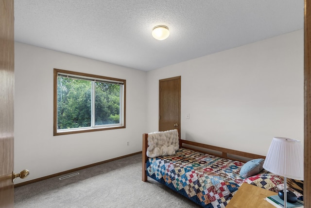2294 Mathias Rd, Shakopee, MN 55379 - carpeted bedroom featuring baseboards and a textured ceiling