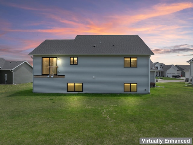 1764 Brandt Dr NE, Byron, MN 55920 - rear view of property with a yard
