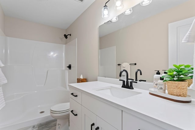 1764 Brandt Dr NE, Byron, MN 55920 - full bathroom featuring a shower, toilet, and vanity