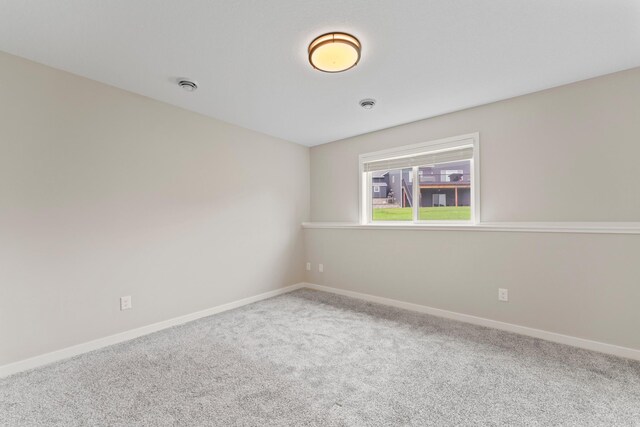 1764 Brandt Dr NE, Byron, MN 55920 - carpeted empty room featuring baseboards