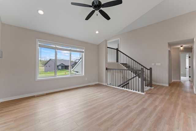 1764 Brandt Dr NE, Byron, MN 55920 - unfurnished living room featuring ceiling fan, light wood-style floors, baseboards, recessed lighting, and high vaulted ceiling