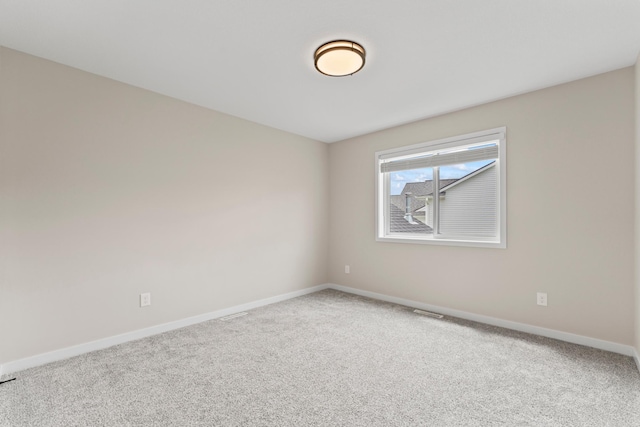 1764 Brandt Dr NE, Byron, MN 55920 - carpeted spare room with baseboards