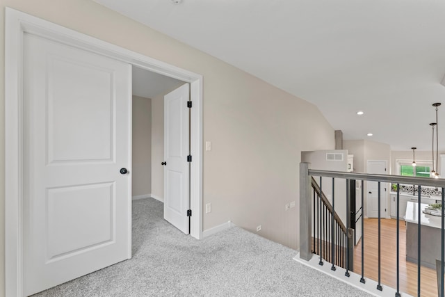 1764 Brandt Dr NE, Byron, MN 55920 - corridor featuring an upstairs landing, carpet, baseboards, and recessed lighting