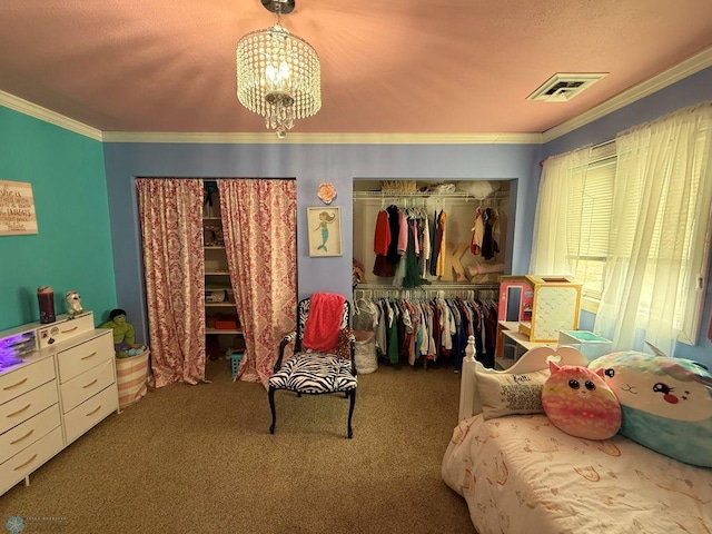 436 2nd Ave E, Halstad, MN 56548 - carpeted bedroom with crown molding, a chandelier, and a closet
