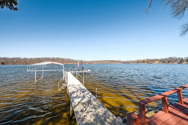 view of dock with a water view and boat lift