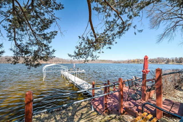 view of dock with a water view
