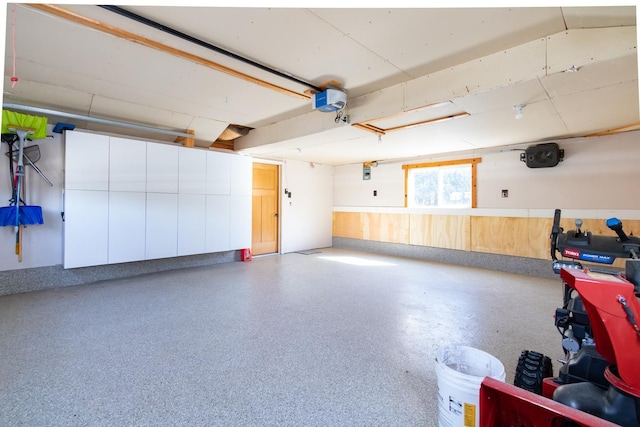 garage featuring a garage door opener