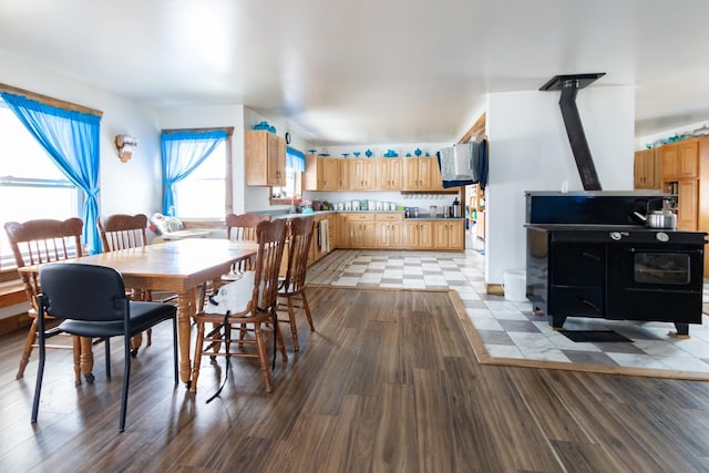 dining room featuring a wood stove