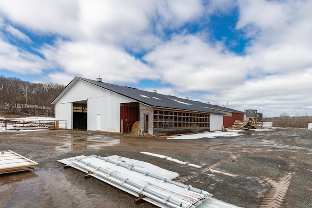 exterior space with an outbuilding and an exterior structure