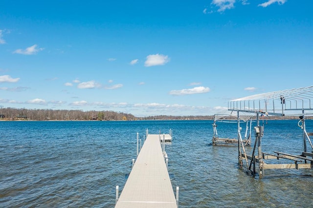 dock featuring a water view and boat lift