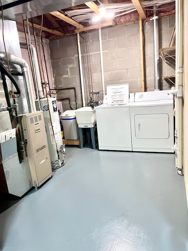 953 14th Ln SE, Cambridge, MN 55008 - unfinished basement featuring separate washer and dryer and water heater