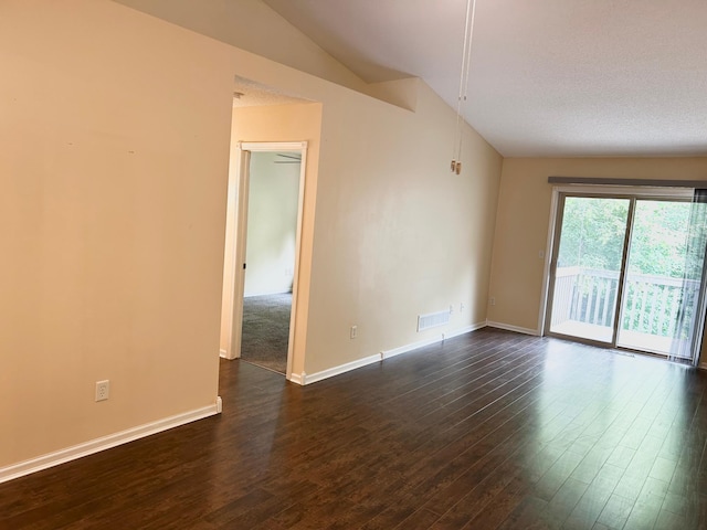953 14th Ln SE, Cambridge, MN 55008 - empty room with dark wood-type flooring and lofted ceiling