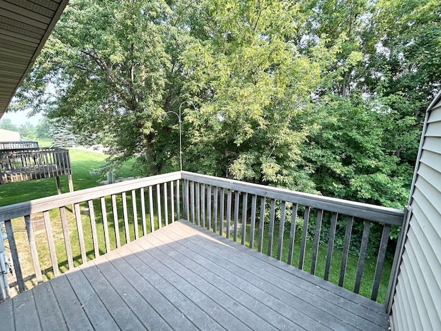953 14th Ln SE, Cambridge, MN 55008 - deck with a lawn