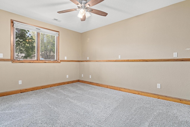 4418 Chowen Ave N, Robbinsdale, MN 55422 - carpeted spare room with baseboards and ceiling fan
