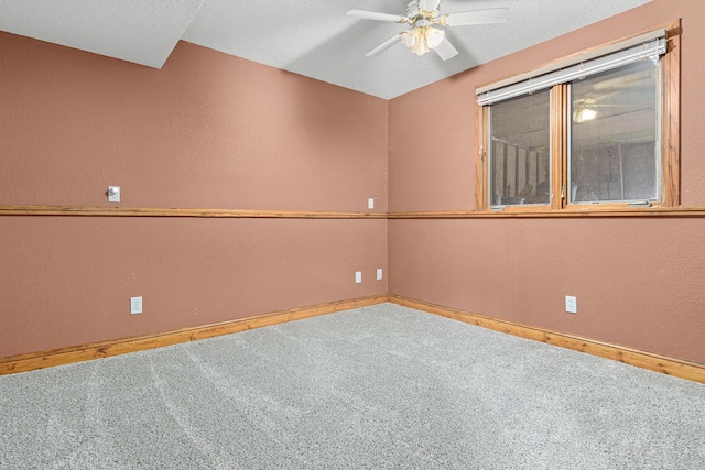 4418 Chowen Ave N, Robbinsdale, MN 55422 - unfurnished room featuring carpet floors, baseboards, a ceiling fan, and a textured wall
