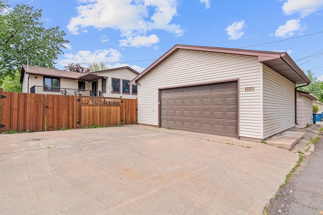 4418 Chowen Ave N, Robbinsdale, MN 55422 - view of front of house featuring a detached garage and an outbuilding