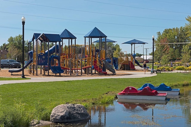 community playground featuring a yard