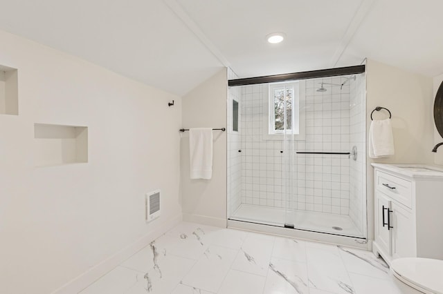 full bath with a shower stall, vanity, toilet, marble finish floor, and baseboards