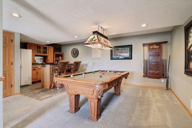 recreation room featuring light colored carpet, baseboards, and billiards