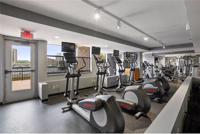 401 1st St Unit 308, Minneapolis, MN 55401 - gym featuring rail lighting and baseboards