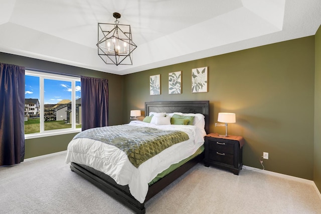 4737 130th Ln NE, Blaine, MN 55449 - bedroom with carpet floors, baseboards, a chandelier, and a raised ceiling