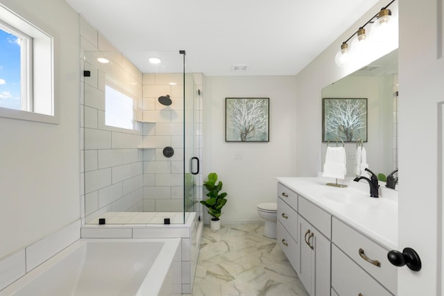 4737 130th Ln NE, Blaine, MN 55449 - bathroom featuring marble finish flooring, vanity, a shower stall, toilet, and a bath