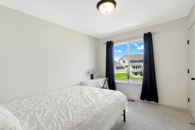 4737 130th Ln NE, Blaine, MN 55449 - bedroom with carpet floors and baseboards