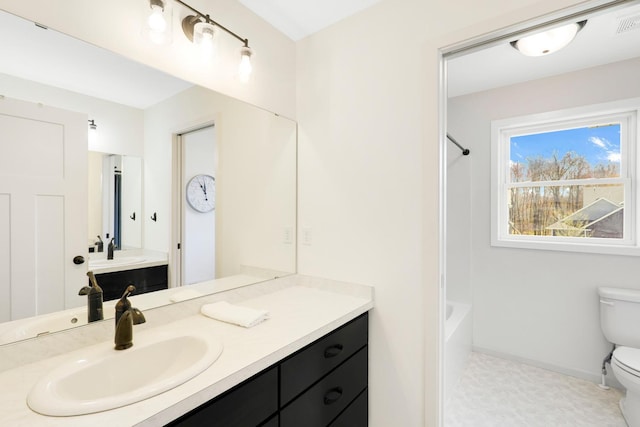 4737 130th Ln NE, Blaine, MN 55449 - full bathroom featuring toilet, vanity, shower / tub combination, and baseboards