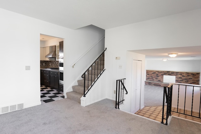 7740 Arlington Ave N, Brooklyn Park, MN 55443 - staircase featuring carpet flooring and visible vents