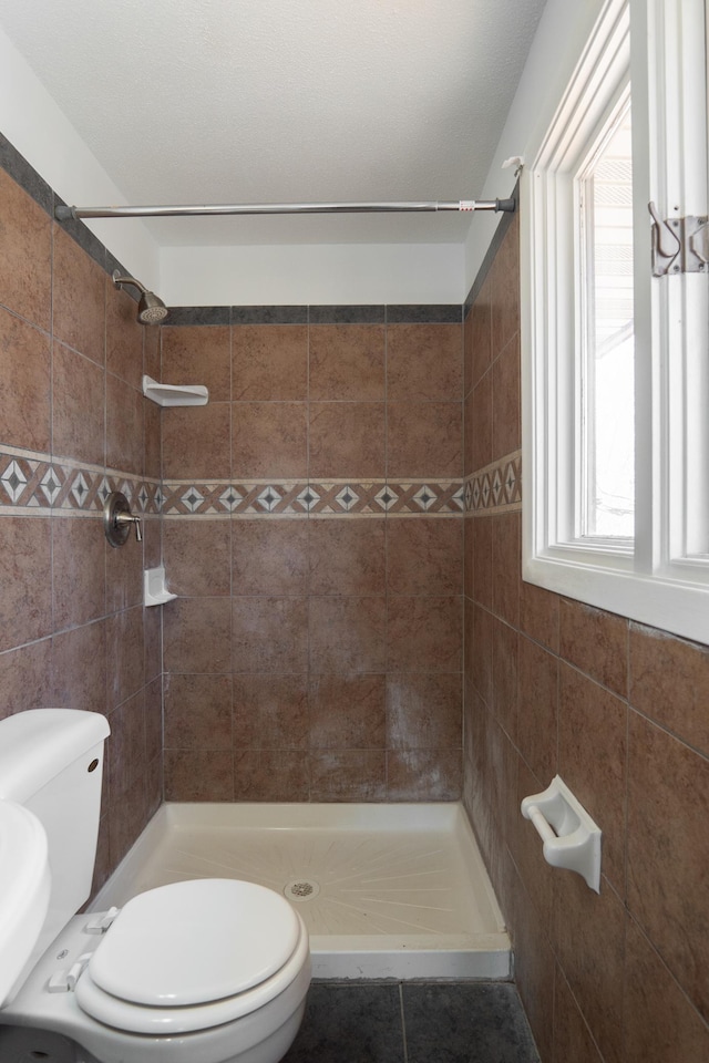 7740 Arlington Ave N, Brooklyn Park, MN 55443 - bathroom with toilet and a stall shower