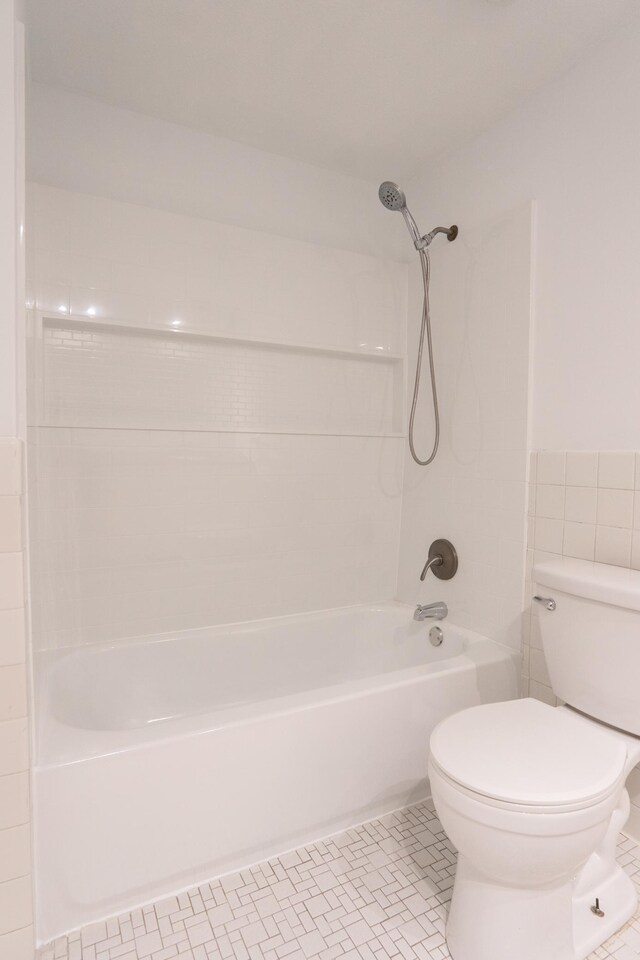 7740 Arlington Ave N, Brooklyn Park, MN 55443 - bathroom with bathtub / shower combination and toilet