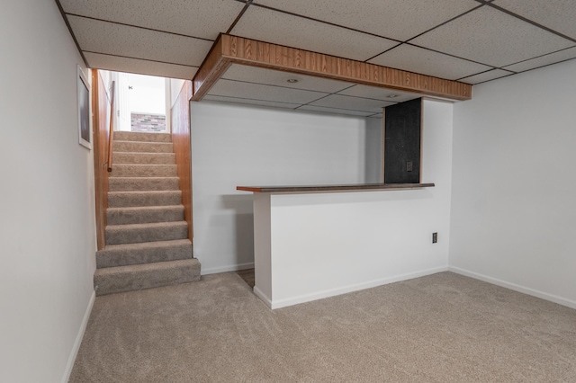 7740 Arlington Ave N, Brooklyn Park, MN 55443 - basement featuring carpet floors, a drop ceiling, and stairway
