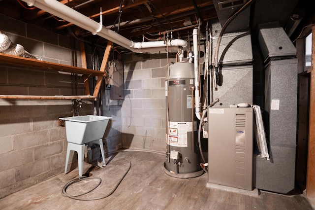 7740 Arlington Ave N, Brooklyn Park, MN 55443 - utility room featuring water heater