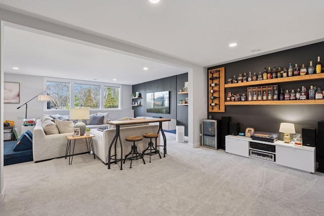living area with carpet floors and recessed lighting