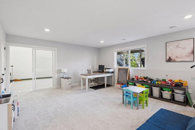 playroom with baseboards, recessed lighting, and carpet