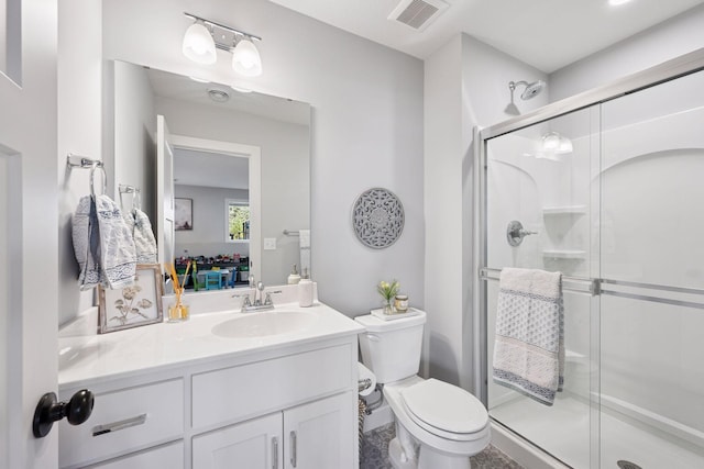 bathroom featuring visible vents, toilet, a shower stall, connected bathroom, and vanity