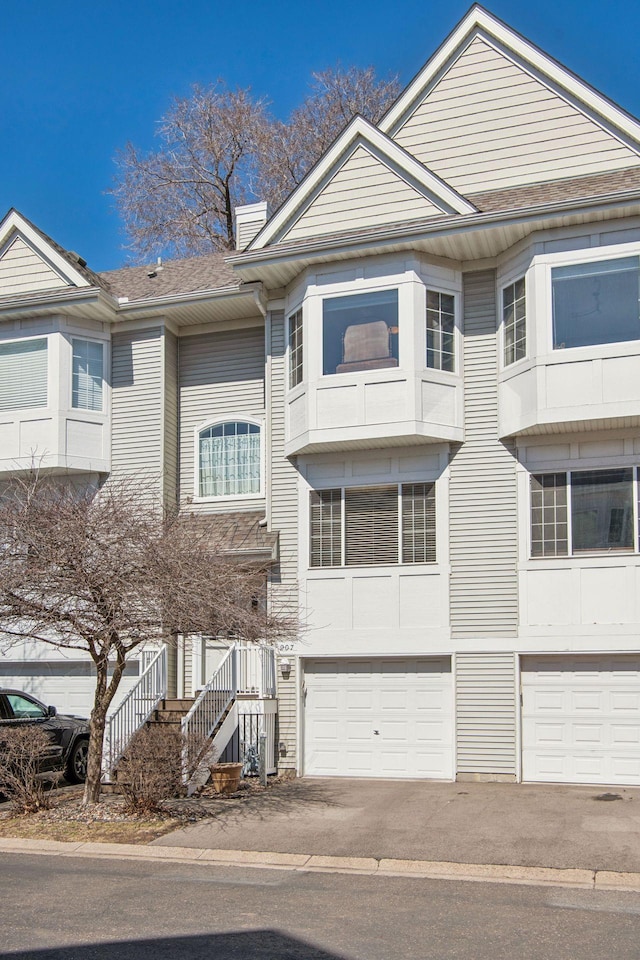907 Fairfield Way, Minnetonka, MN 55305 - townhome / multi-family property with a garage and asphalt driveway