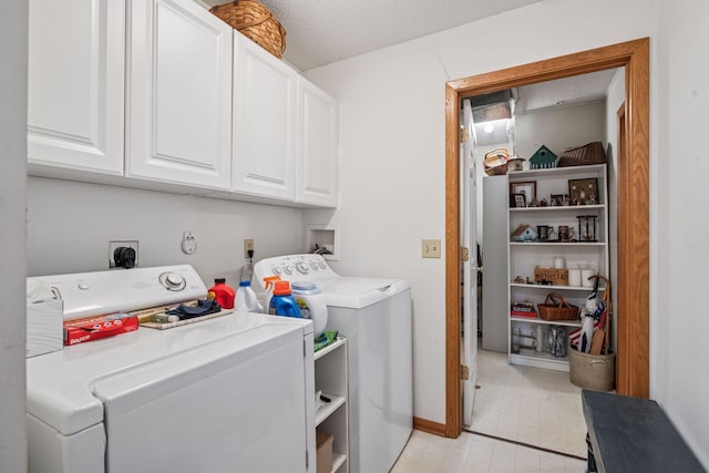 907 Fairfield Way, Minnetonka, MN 55305 - washroom featuring washer and clothes dryer, cabinet space, and light flooring