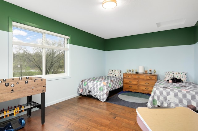 1602 River St, Monticello, MN 55362 - bedroom featuring hardwood / wood-style flooring and baseboards