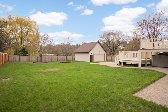 1602 River St, Monticello, MN 55362 - view of yard with a deck, an outdoor structure, and a detached garage