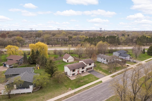 1602 River St, Monticello, MN 55362 - aerial perspective of suburban area featuring a tree filled landscape