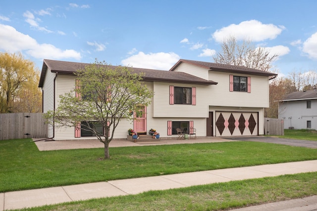 1602 River St, Monticello, MN 55362 - bi-level home with driveway, a gate, and an attached garage