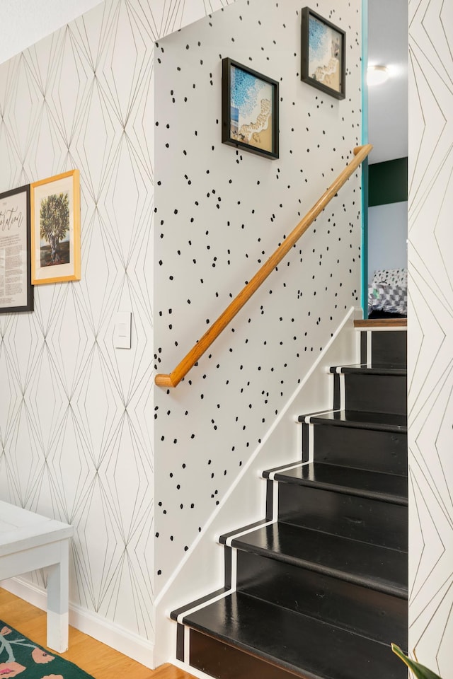 1602 River St, Monticello, MN 55362 - stairs featuring wallpapered walls and wood finished floors