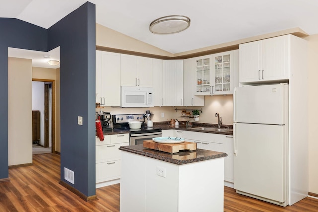 2628 Sumac Ct, White Bear Lake, MN 55110 - kitchen featuring white appliances, a sink, lofted ceiling, wood finished floors, and white cabinets