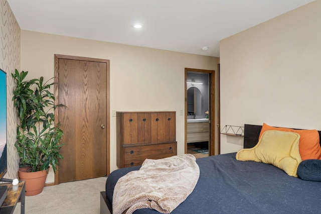 2628 Sumac Ct, White Bear Lake, MN 55110 - carpeted bedroom with connected bathroom and recessed lighting